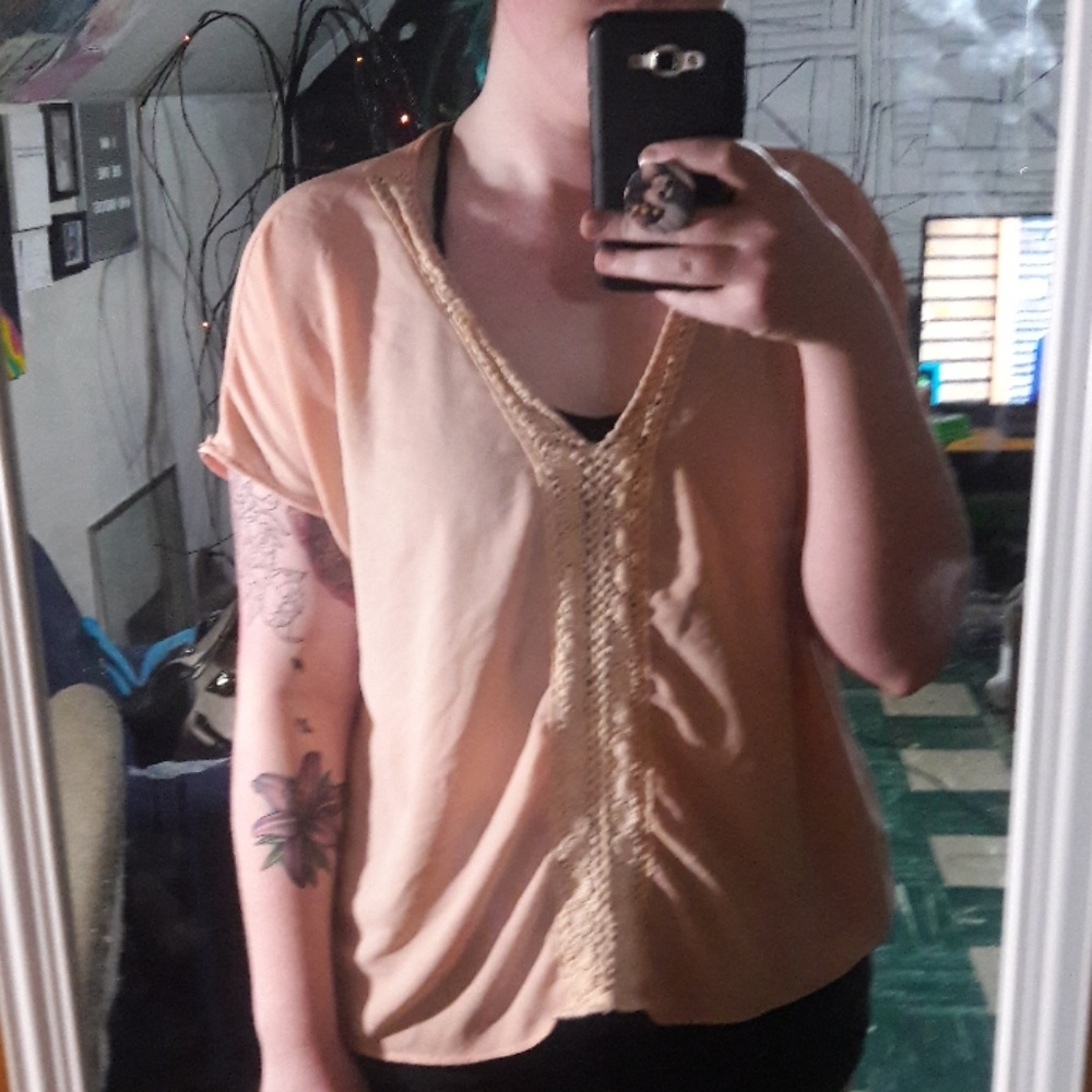 Peach blouse with crochet details